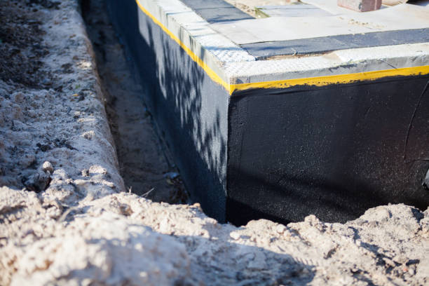Professional Emergency Waterproofing technician working in Summertown, TN